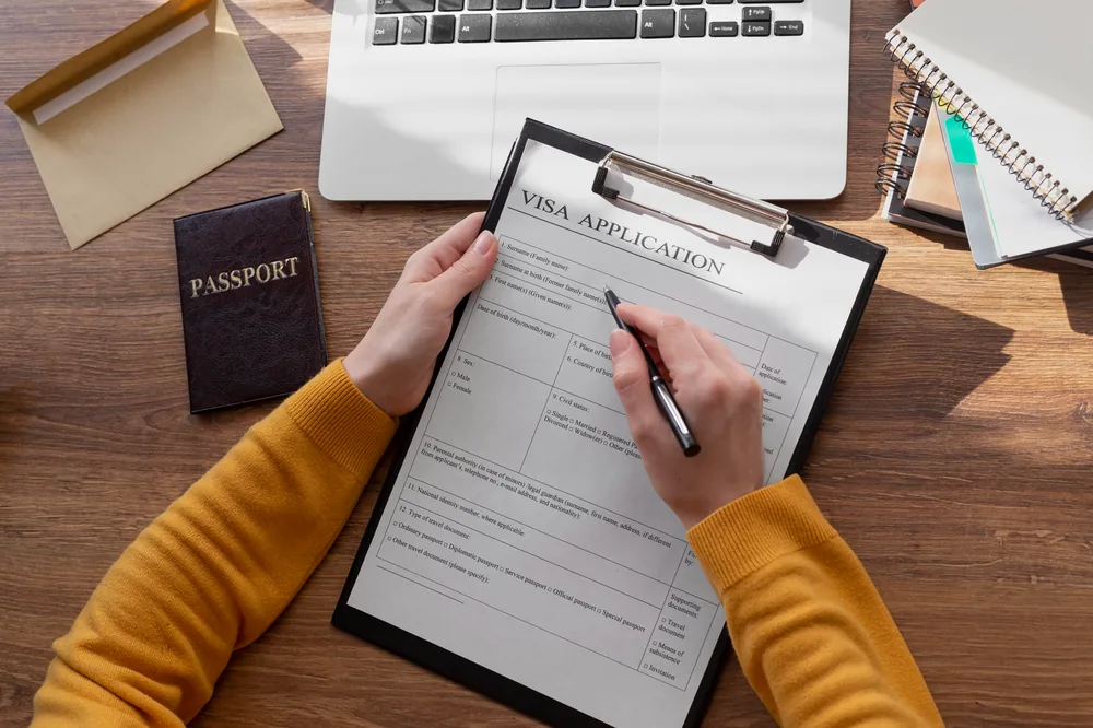 Filling out a visa application form
